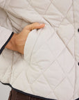 STORIES BE TOLD APEX COLLARELESS QUILTED CONTRAST PIPING PUFFER JACKET