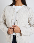 STORIES BE TOLD APEX COLLARLESS PUFFER JACKET