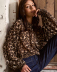 AMONG THE BRAVE EMBRACE LEOPARD GEORGETTE HIGH NECK LS TOP