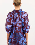 AMONG THE BRAVE EXPEDITION BLUE FLORAL SHIRRED NECK SHORT SLEEVE TOP