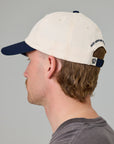 JUST ANOTHER FISHERMAN STAMP TILLER CAP WHITE/NAVY