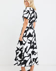 STORIES BE TOLD STAGE CUTOUT PRINT PUFF SLEEVE FLOATY MAXI DRESS