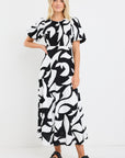 STORIES BE TOLD STAGE CUTOUT PRINT PUFF SLEEVE FLOATY MAXI DRESS