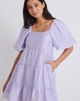 STORIES BE TOLD BEYOND PUFF SLEEVE TIERED MINI DRESS