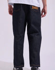 HUFFER BLOCK DENIM EMB PANT- INDIGO