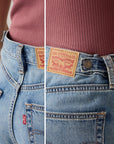 LEVIS CINCH MID-THIGH SHORT LIFT UP