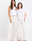 AMONG THE BRAVE ZOEY PETITE HIGH RISE WIDE LEG POCKET JEAN