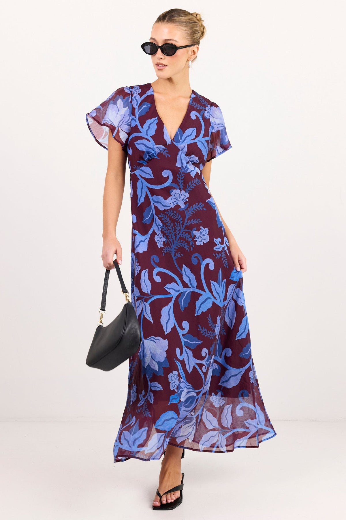 AMONG THE BRAVE CHARIOT BLUE FLORAL FLUTTER SLEEVE MAXI DRESS