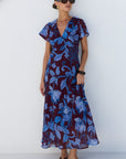 AMONG THE BRAVE CHARIOT BLUE FLORAL FLUTTER SLEEVE MAXI DRESS