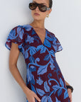 AMONG THE BRAVE CHARIOT BLUE FLORAL FLUTTER SLEEVE MAXI DRESS