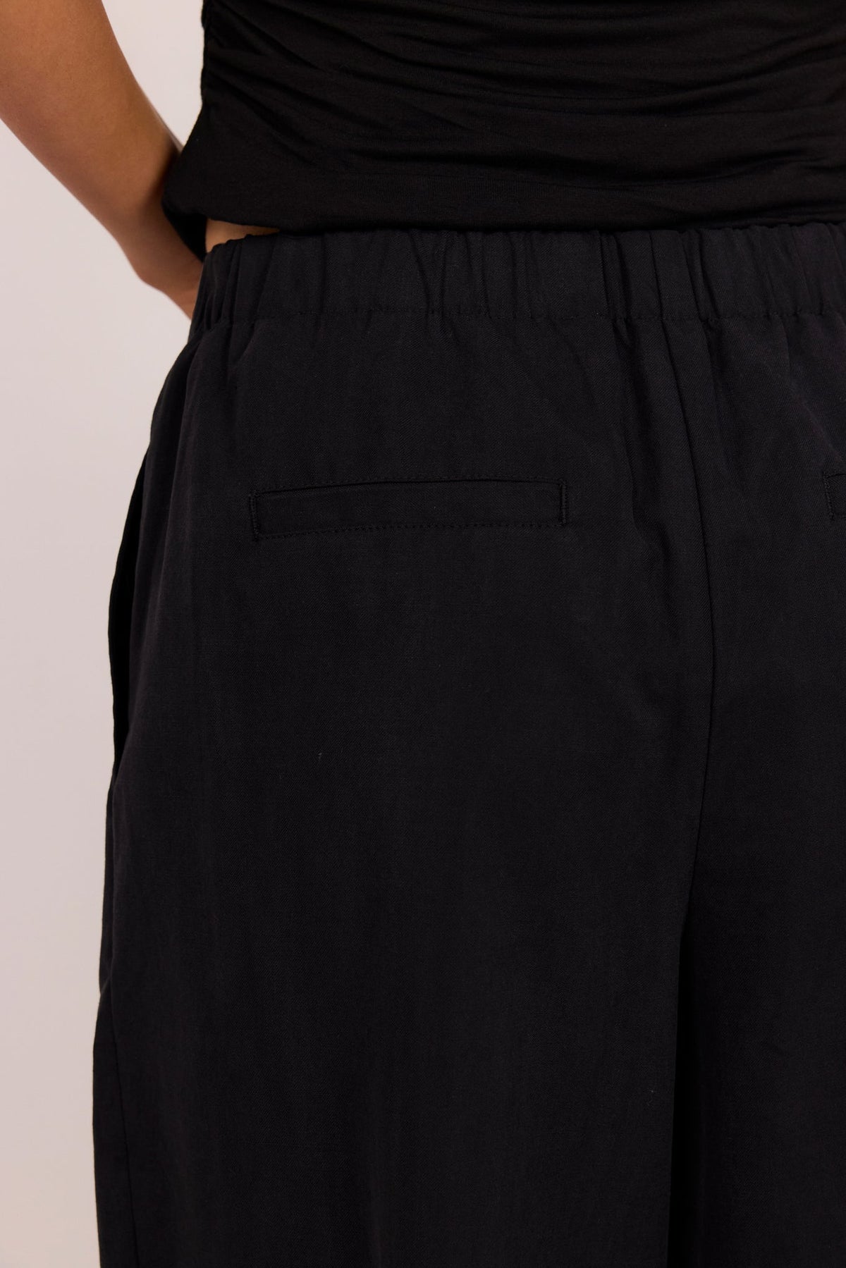 STORIES BE TOLD MANIFESTO FRONT PLEAT BARREL LEG PANTS