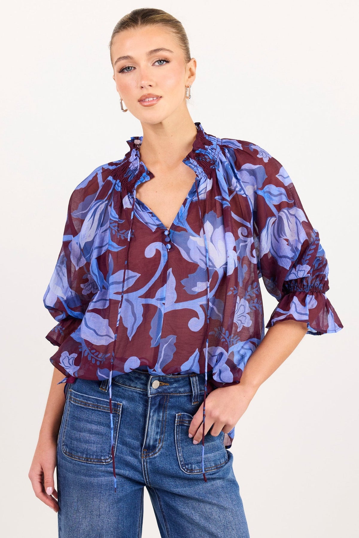AMONG THE BRAVE EXPEDITION BLUE FLORAL SHIRRED NECK SHORT SLEEVE TOP