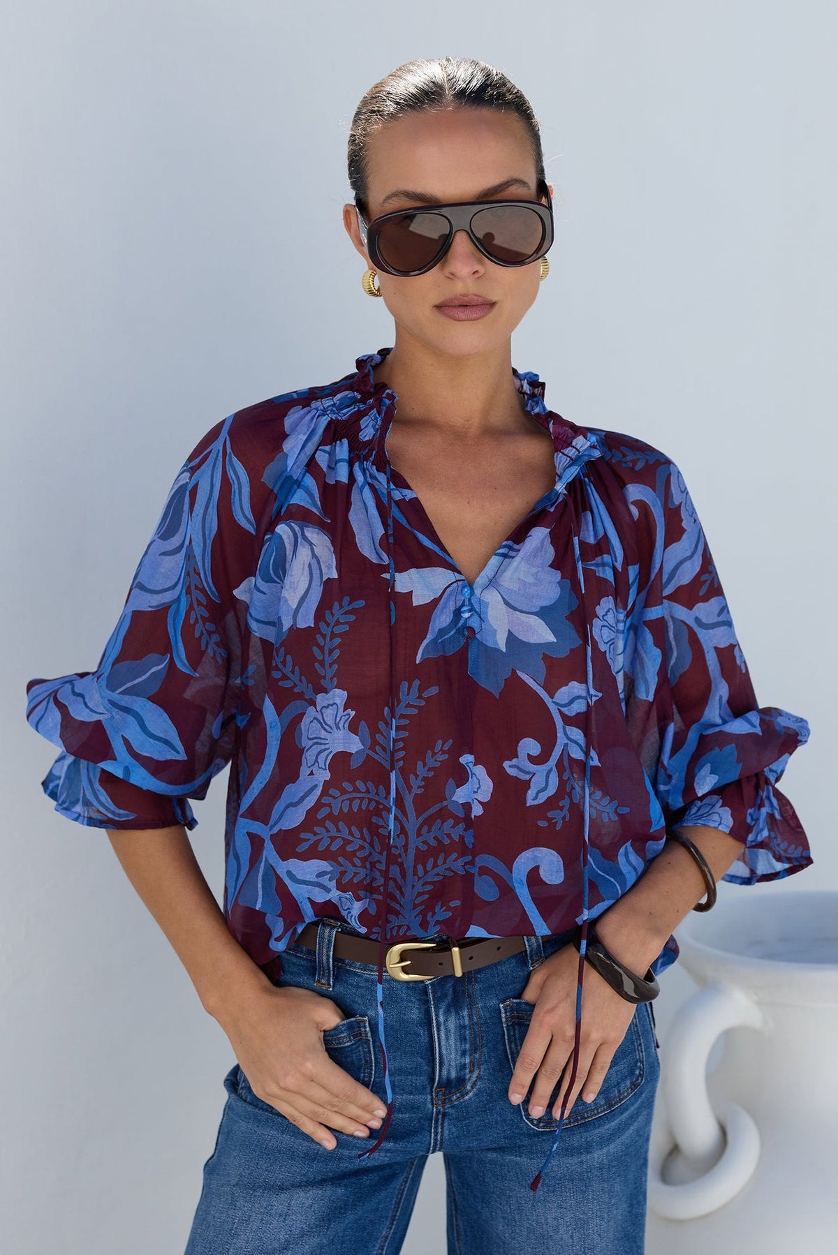 AMONG THE BRAVE EXPEDITION BLUE FLORAL SHIRRED NECK SHORT SLEEVE TOP