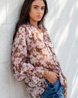 AMONG THE BRAVE ODYSSEY BLUSH FLORAL SHIRRED NECK LS TOP