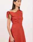 AMONG THE BRAVE REFLECT LINEN ONE SHOULDER BOW MINI DRESS
