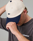 JUST ANOTHER FISHERMAN STAMP TILLER CAP WHITE/NAVY