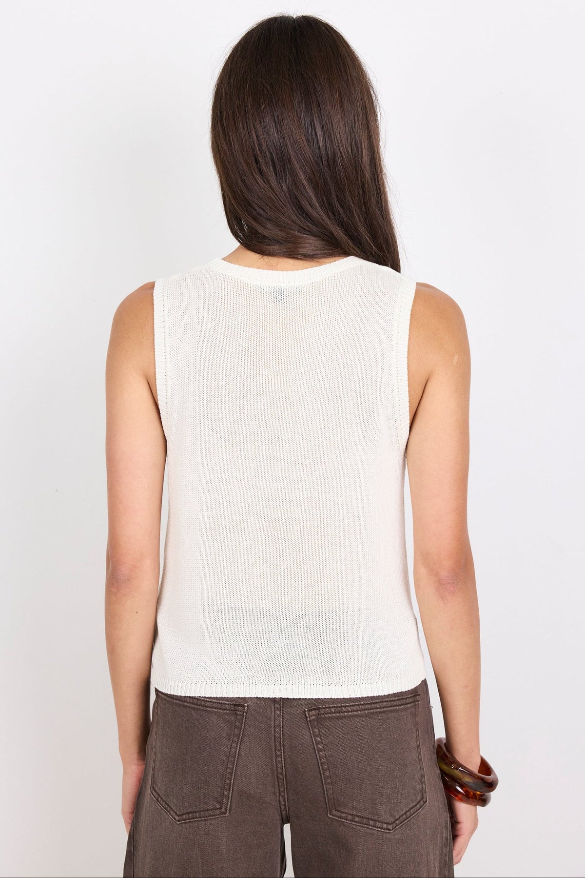 AMONG THE BRAVE SALUTE RELAXED SLEEVELESS KNIT TOP